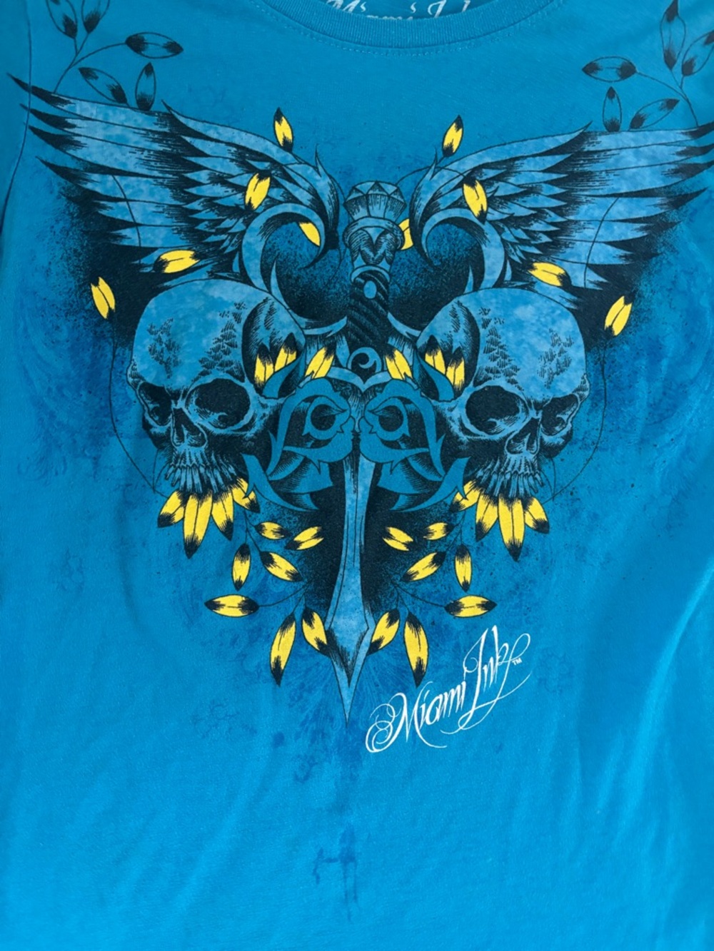 Woman’s Blue Miami Ink Graphic Skull & Wings Crew Neck T-Shirt